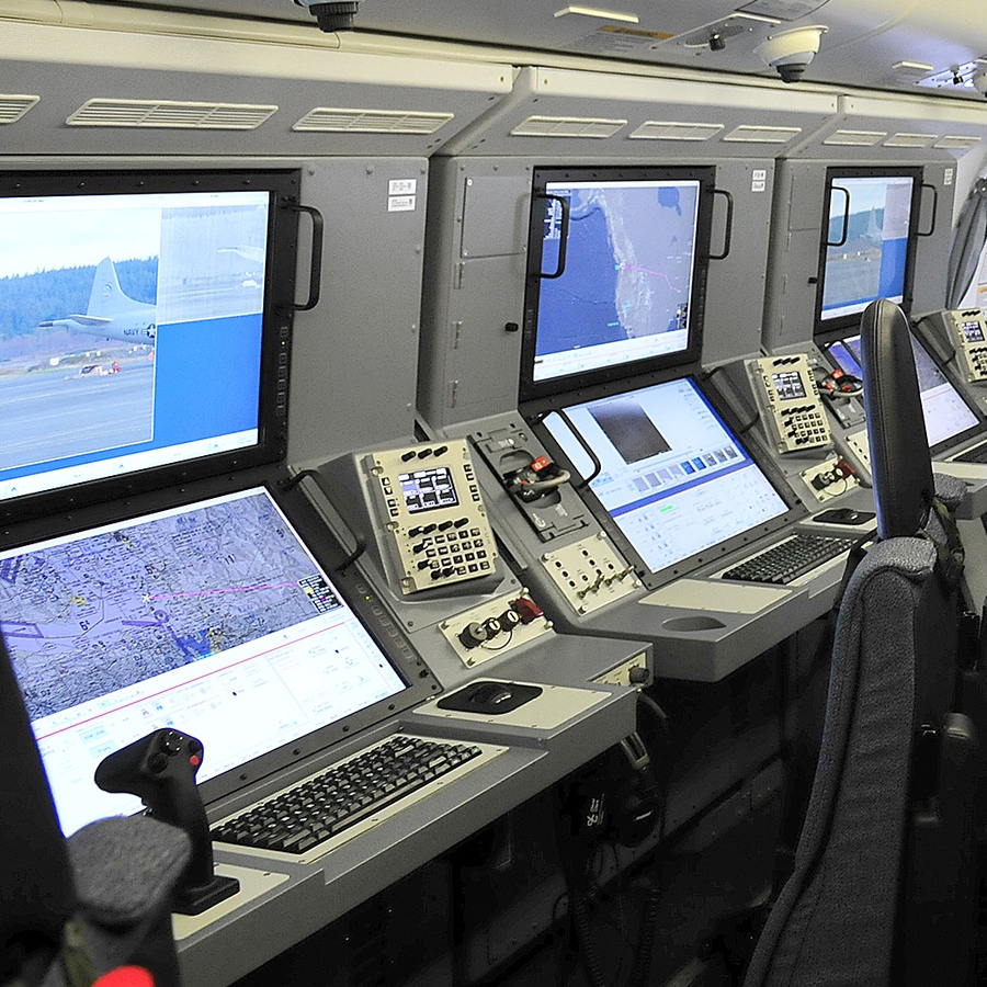 Inside the P-8A showing several of the workstations